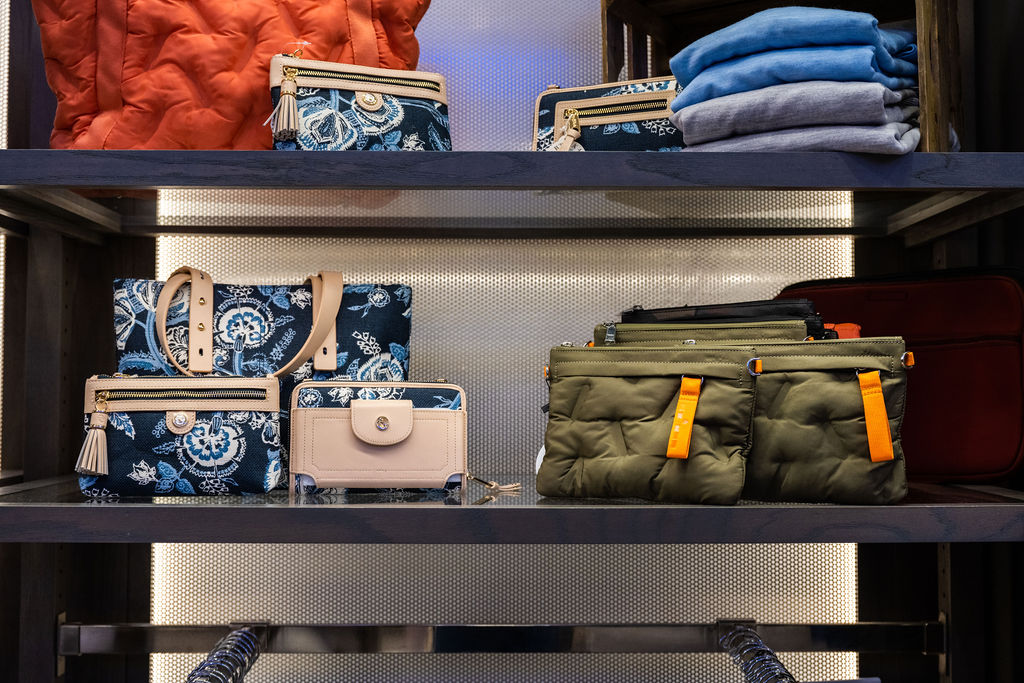 Bags and accessories displayed on a shelf